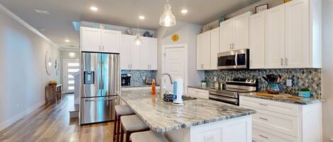Coffee/tea maker, fridge, microwave, oven