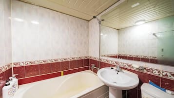 Double Room | Bathroom | Shower, hair dryer, towels, soap