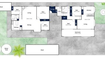 A floor plan of a house with a shed, kitchen, dining, living, and sunroom areas.