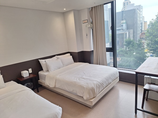Roupas de cama premium, camas com colchões pillow-top, Wi-Fi de cortesia