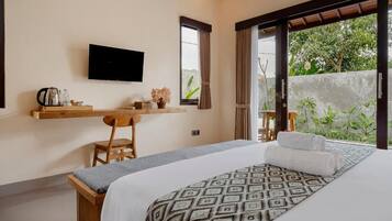 Deluxe Villa, 1 Bedroom, Balcony, Pool View | Minibar, in-room safe, desk, laptop workspace