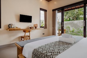 Deluxe Villa, 1 Bedroom, Balcony, Pool View | Minibar, in-room safe, desk, laptop workspace - Tiny's House Ubud (Ubud)