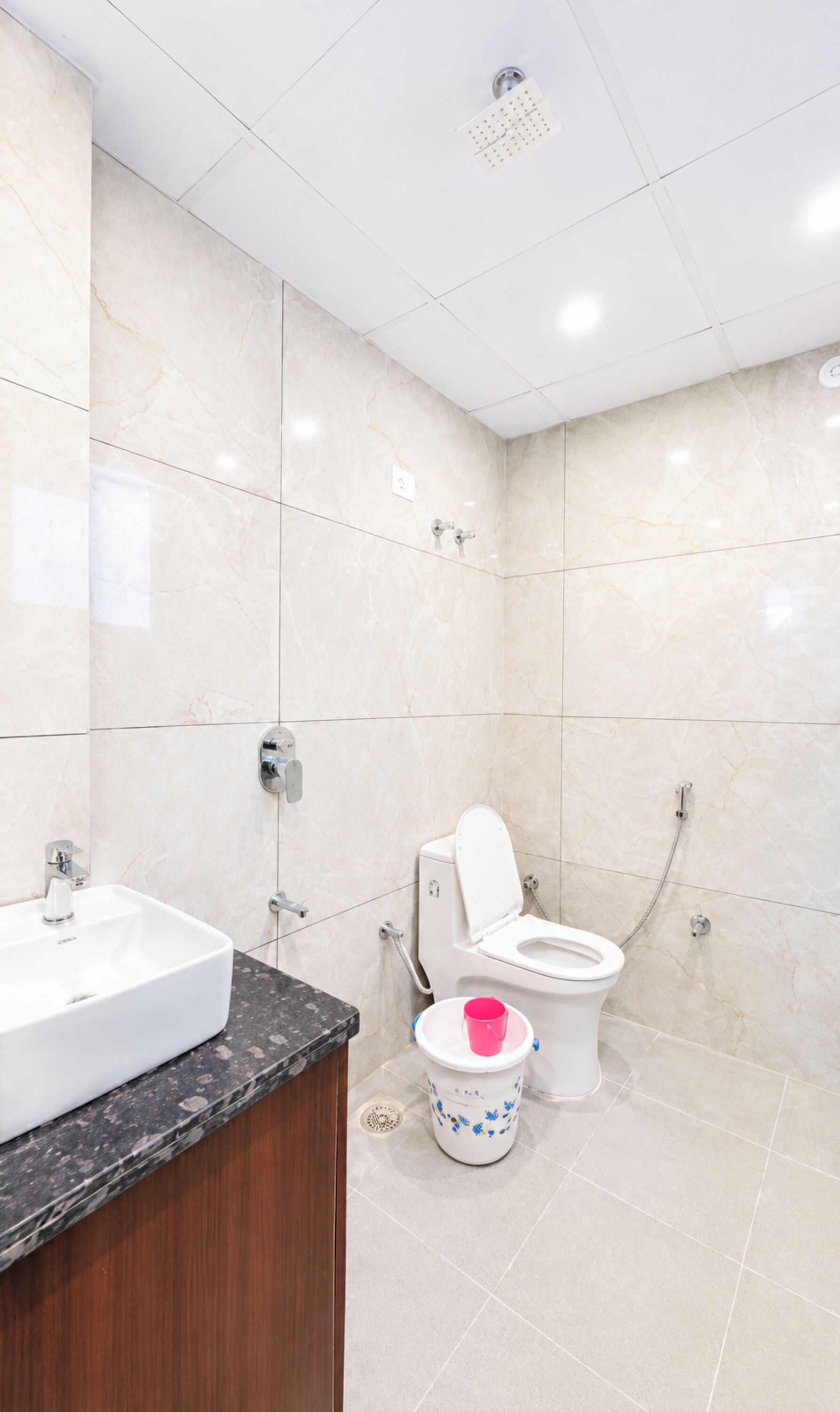 Shower, rainfall showerhead, slippers, towels