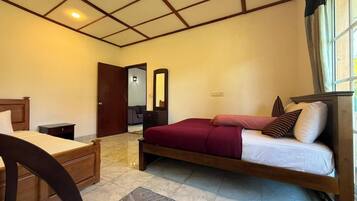 Deluxe Villa, Lake View | Living area | 32-inch LCD TV with cable channels