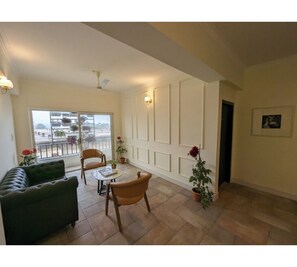 Quarto casal luxo | Área de estar