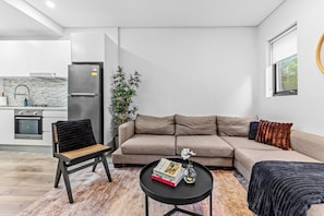 Deluxe Apartment, 1 Queen Bed, Lanai | Living area - Hoffy's Place - one bedroom with AC (Bondi Beach)