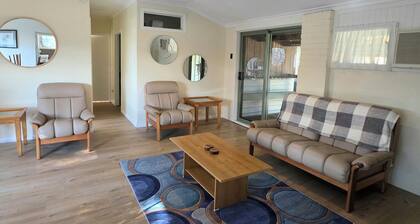 Farm stay Cottage with stunning views, rustic charm and relaxed country comfort.