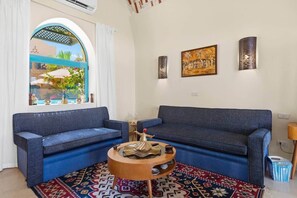 TV - The Downtown Oasis I Nesty Hospitality (Hurghada)