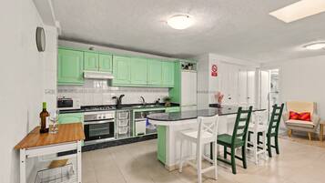 Coffee/tea maker, fridge, microwave, oven