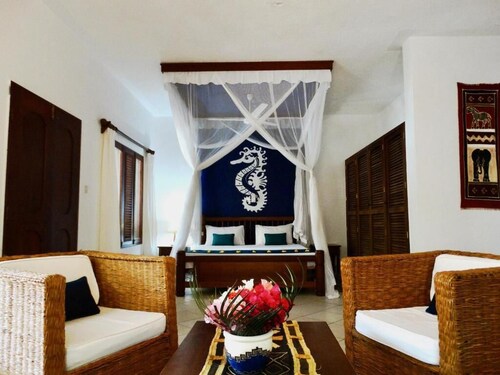 5 minutes walk to the beach, at the center of Diani, 1 & 2 bedroomed cottages