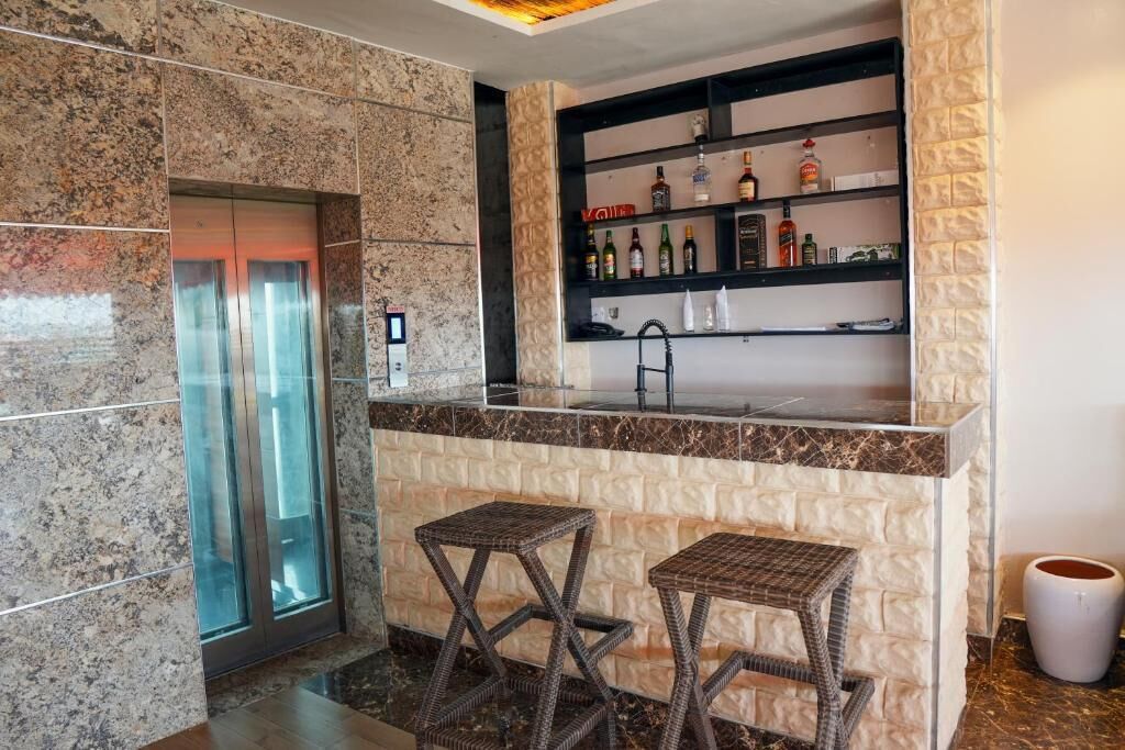 Deluxe Apartment, Balcony, City View | Bar (on property)