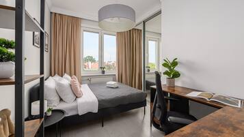 Superior Apartment, City View | Premium bedding, blackout drapes, soundproofing, iron/ironing board