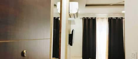 Quarto premium, vista para a cidade | Wi-Fi de cortesia
