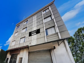 A multi-story building with a sign reading 'Collection.' - Suite Hotel TR (Amritsar)