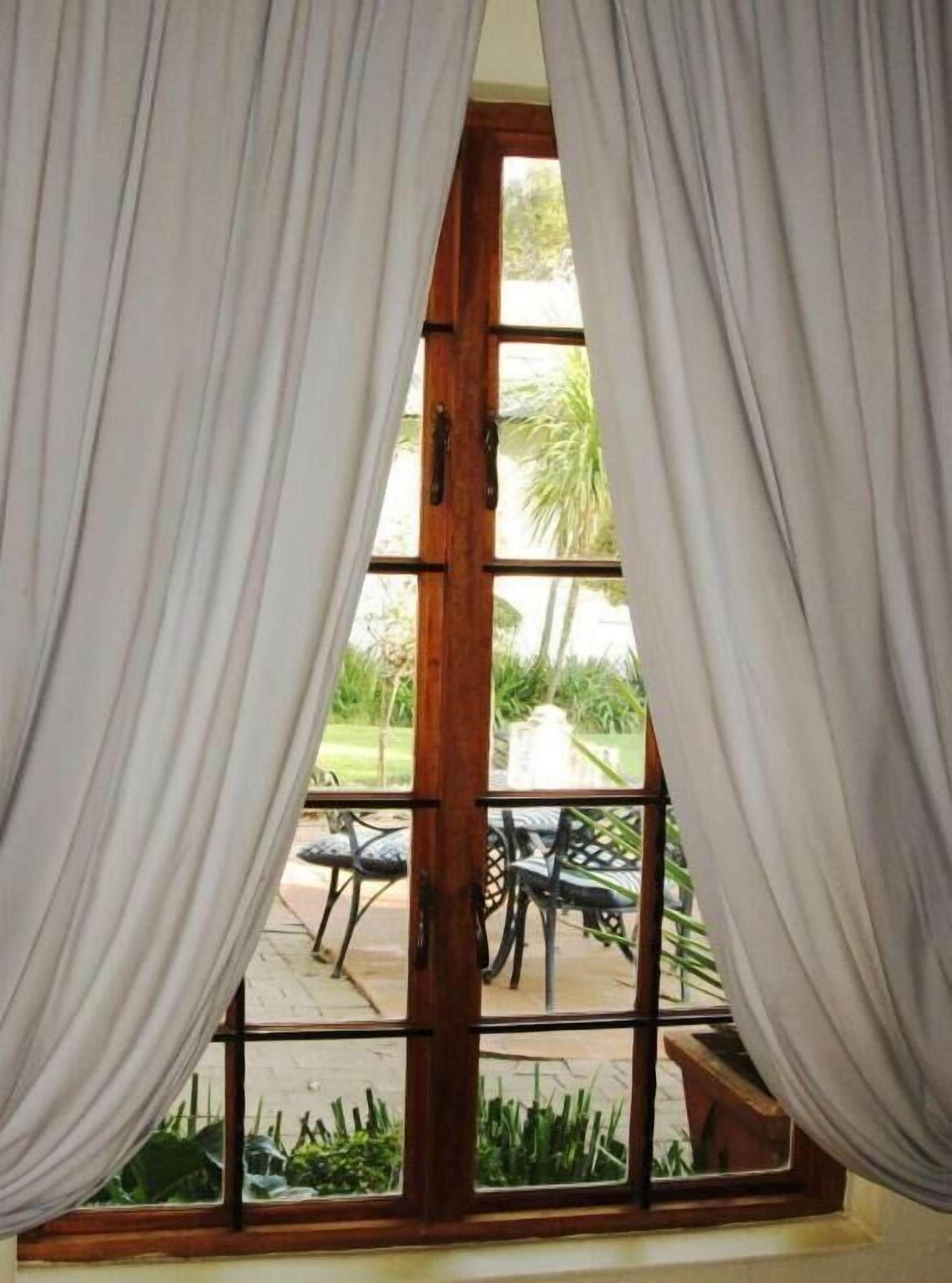 Deluxe Triple Room, Garden View | Interior