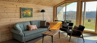 Log cabin apartment on an organic vineyard