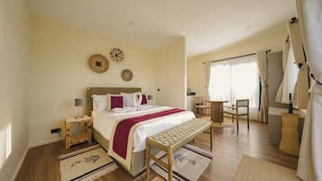 Premium bedding, down duvets, desk, laptop workspace