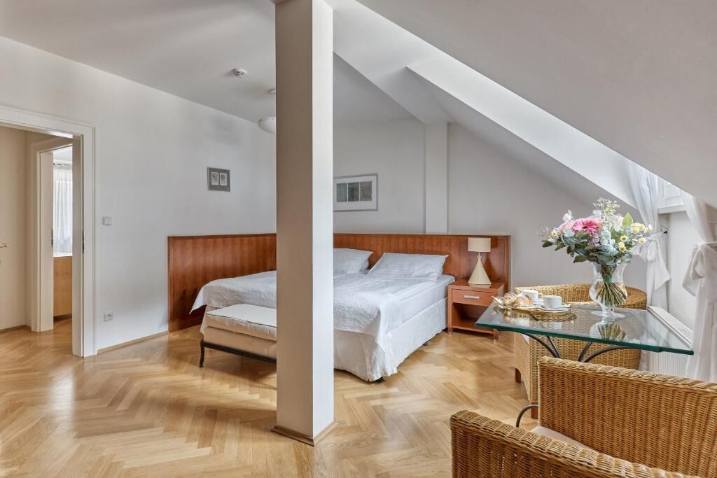 Suite, Courtyard View | In-room safe, soundproofing, iron/ironing board, free WiFi