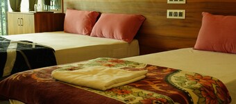 Vasu Inn - Rooms in Valparai