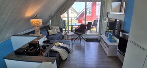 Fernseher, Kamin, DVD-Player, Bücher
