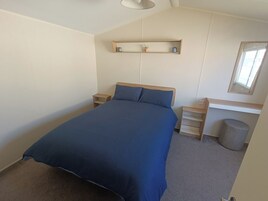 2 dormitorios, tabla de planchar con plancha, wifi gratis y ropa de cama