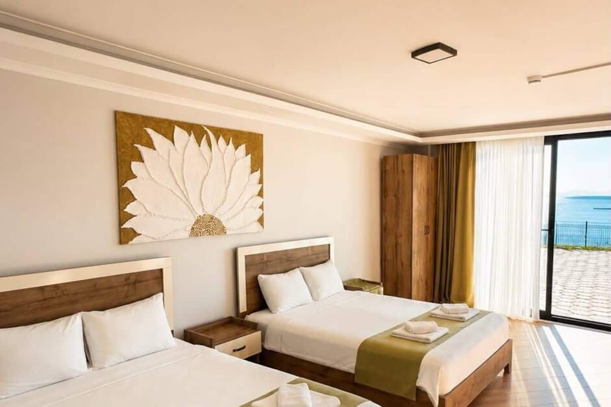 Habitación cuádruple clásica, balcón, vista al mar | Wifi gratis 
