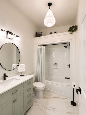 Hair dryer, towels, soap, toilet paper - Sunset House | 5BR City Retreat by Trail (Fredericton)