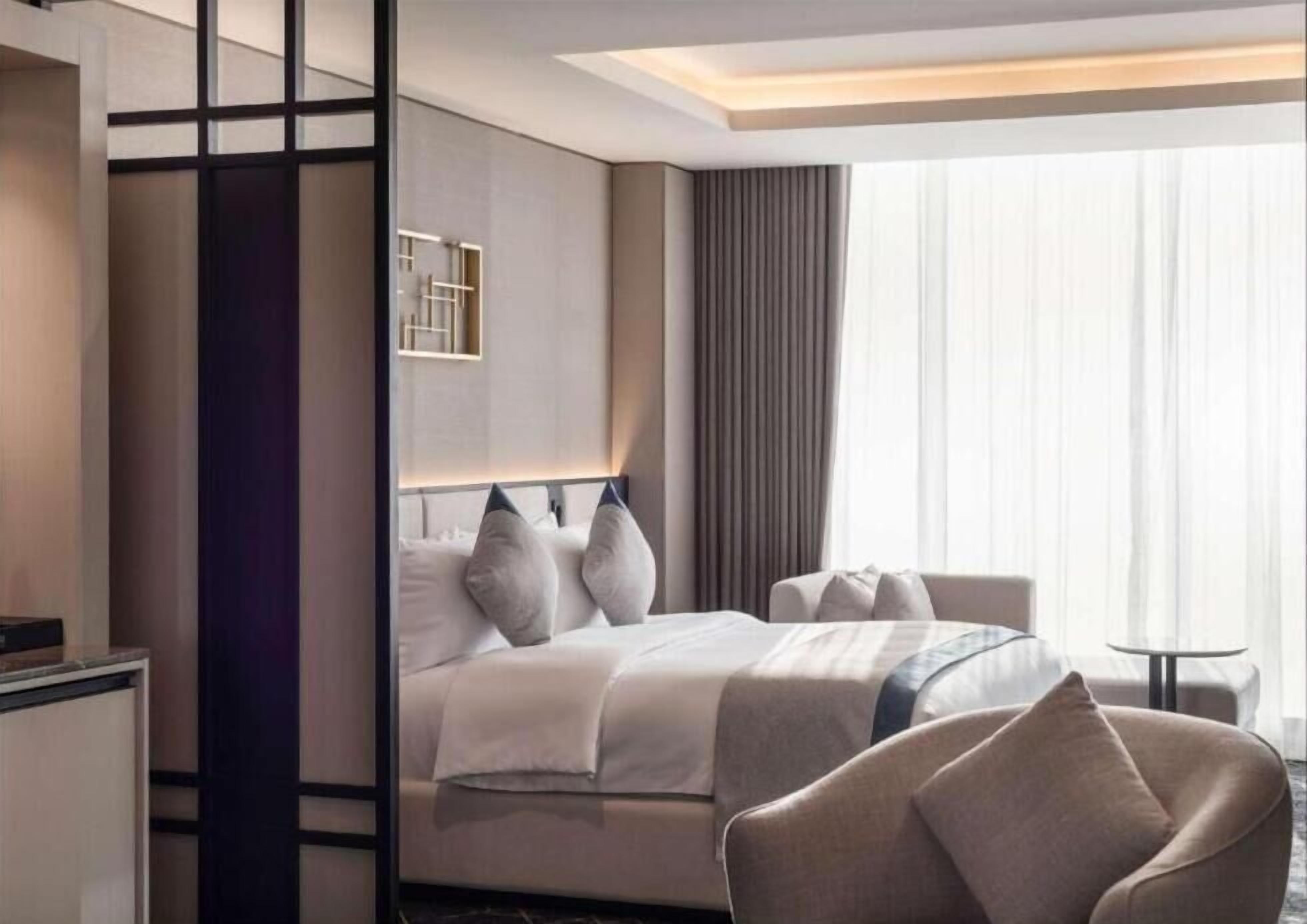 Junior Suite | In-room safe, desk, laptop workspace, iron/ironing board