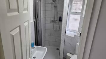 Hair dryer, towels, soap, toilet paper