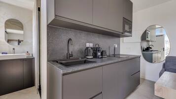 Apartment | Private kitchen | Fridge, microwave, stovetop, dishwasher