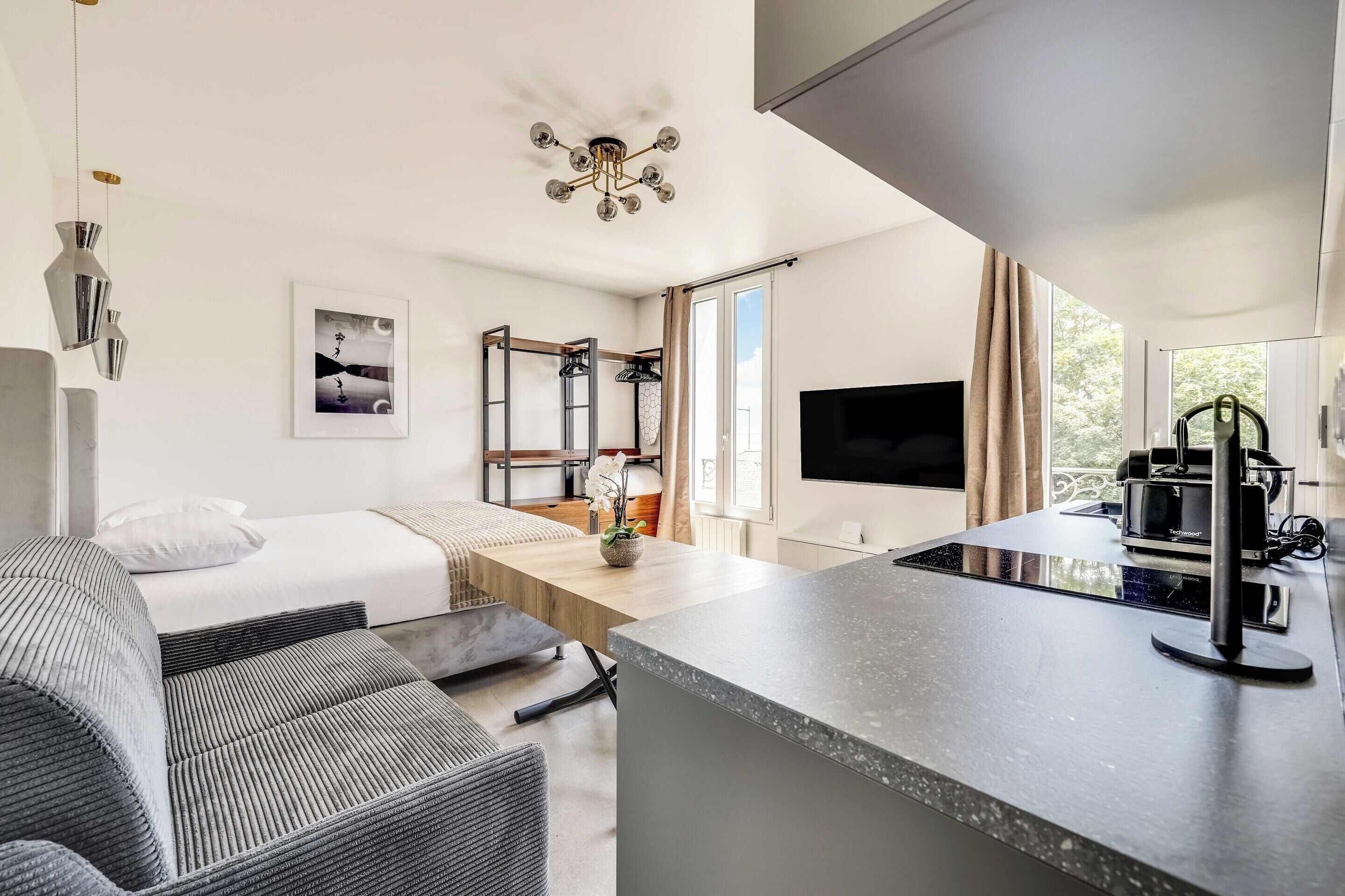 Apartment | Laptop workspace, iron/ironing board, bed sheets