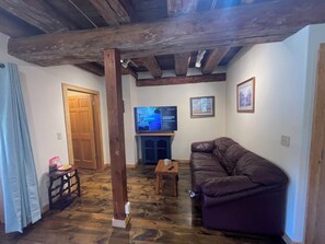 Living area - 3-bedroom historic barn, near peaceful Suttons Bay with AC, and Views of the Bay (Suttons Bay)