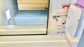 Shower, jetted bath, hair dryer, bidet