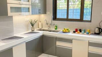 Fridge, stovetop, cookware/dishes/utensils