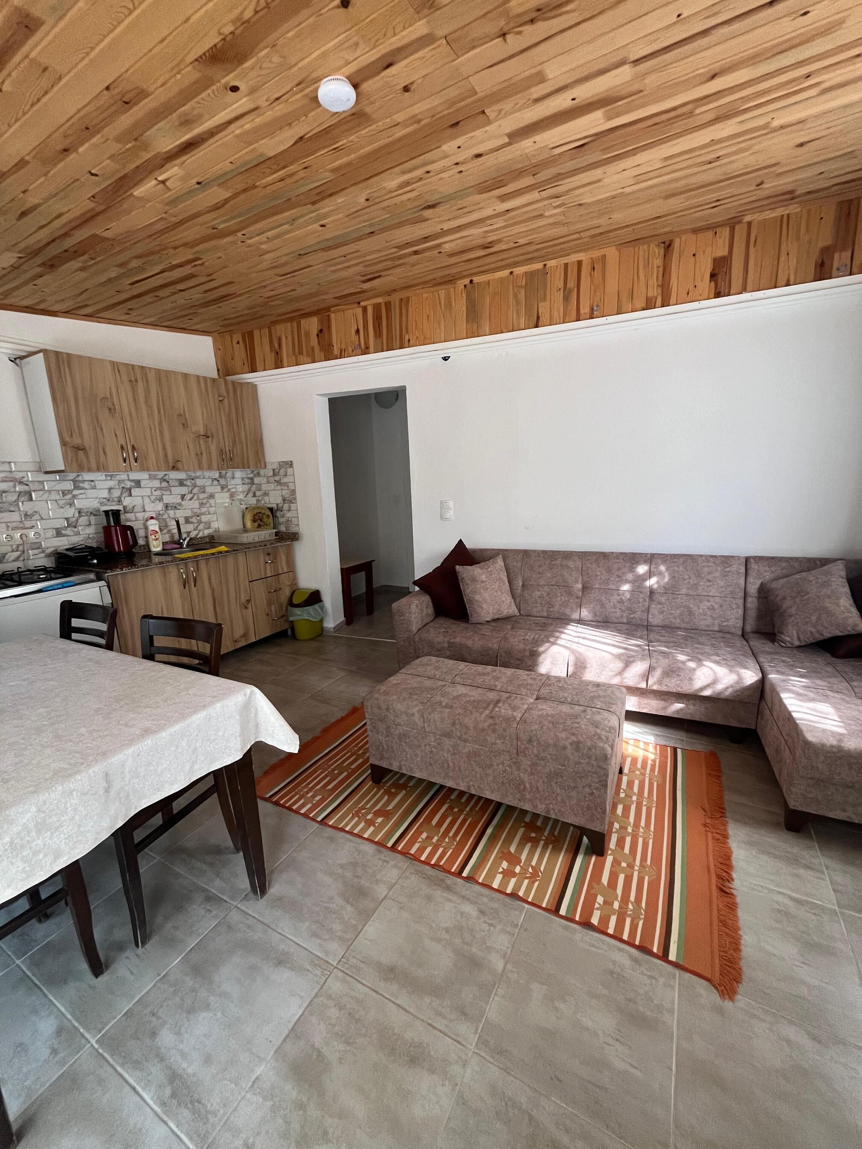 Chambre Quadruple Familiale, balcon | Coin séjour