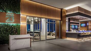 8 bars/lounges, poolside bar