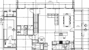 A detailed floor plan of a hotel with a living area, kitchen, and bathroom. - Lakefront Slide House - Bear Lake - New (Fish Haven)