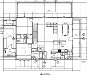Ein detaillierter Grundriss eines Hotels mit Wohnbereich, Küche und Badezimmer.