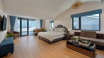 Deluxe Studio Suite, Balcony, City View | Minibar, in-room safe, desk, laptop workspace