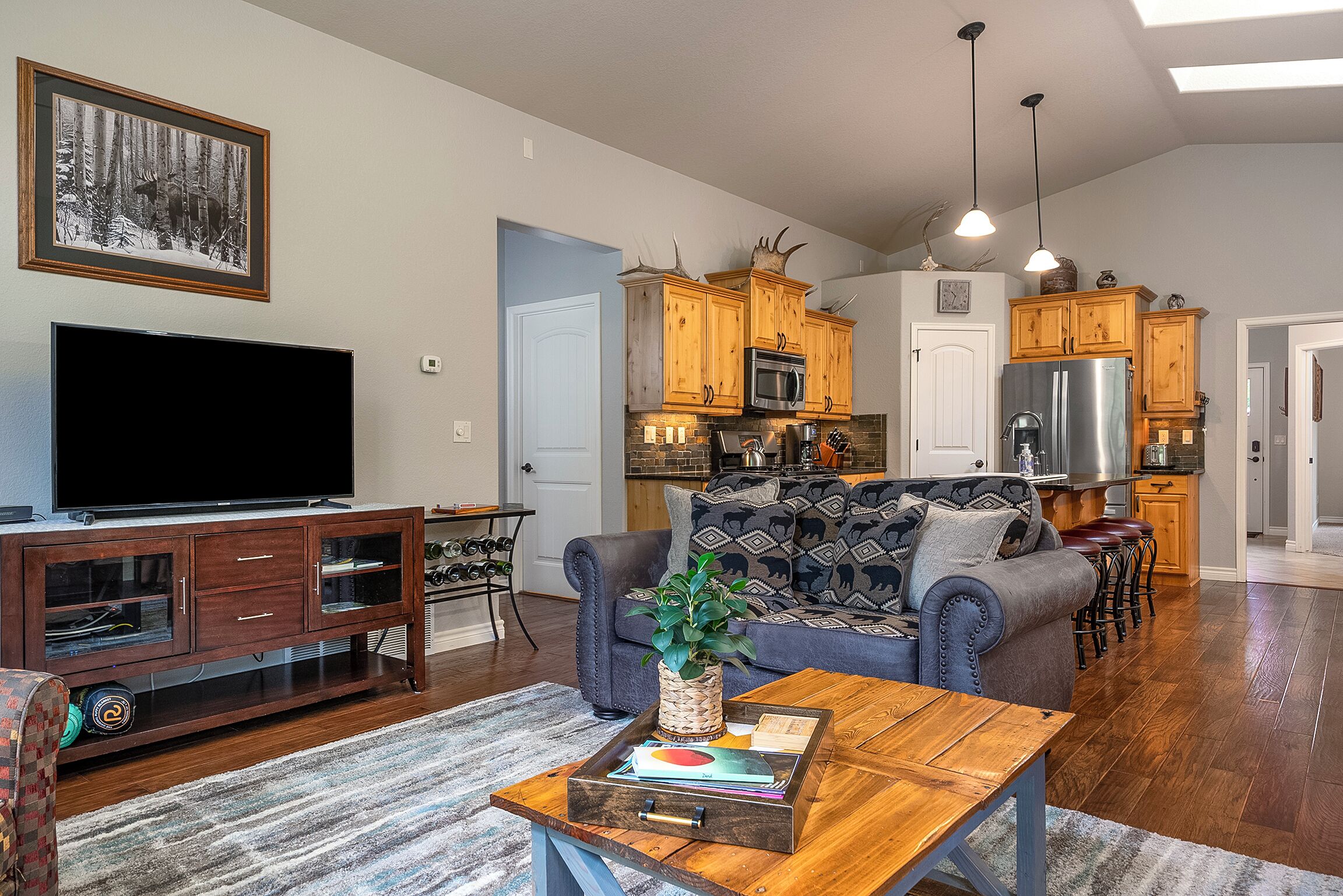 TV, fireplace, books, offices