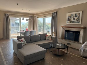 TV, fireplace - Paradise Sea View Apartments – Sea View, Wi-Fi & Air Conditioning (Ligia)
