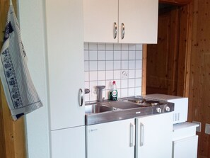 Fridge, oven, cookware/dishes/utensils - Schwendihof, (Flumserberg Tannenheim), by Interhome (Flumserberg Tannenheim)