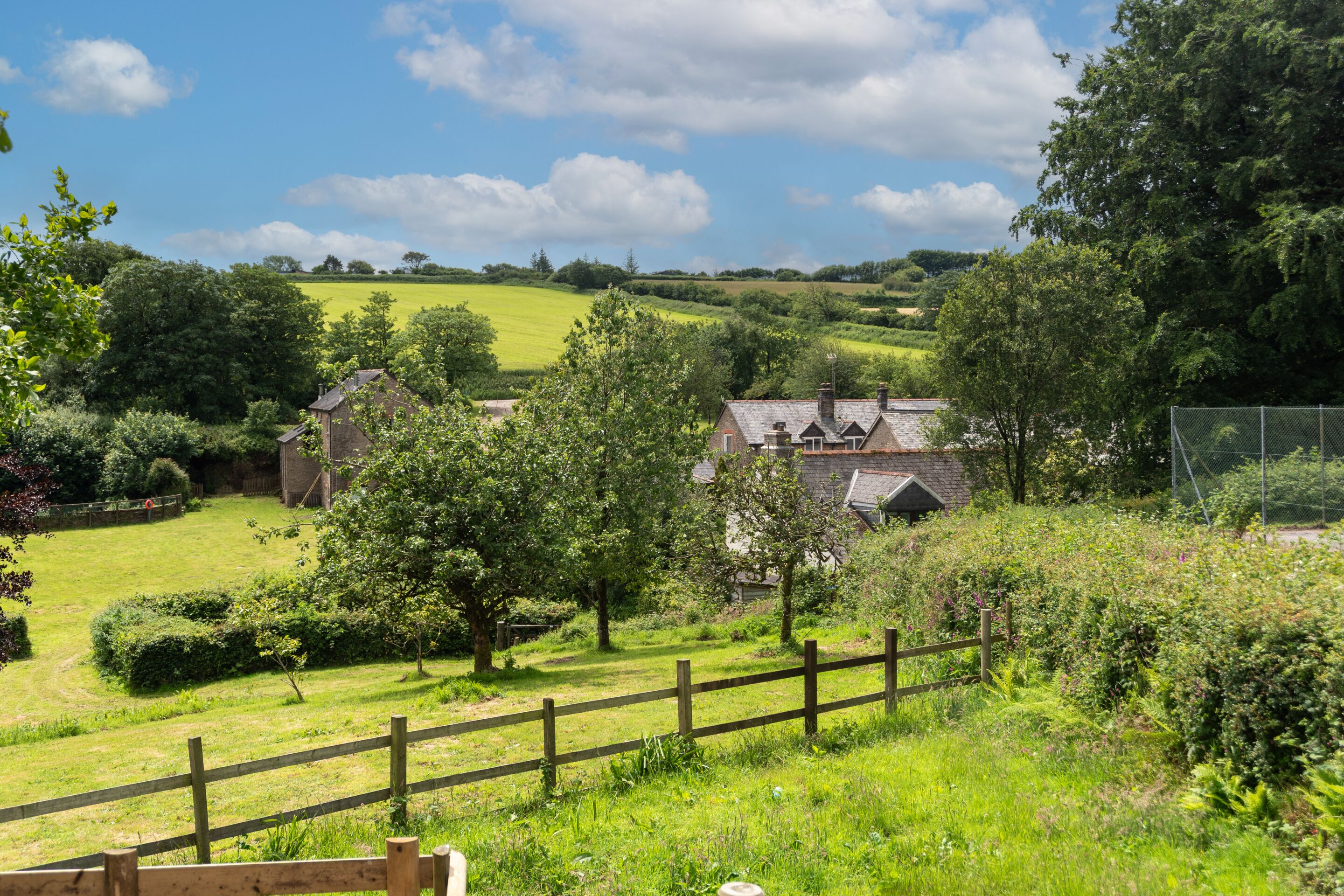 Take in stunning countryside views across the 8-acre grounds, where rolling hills and peaceful surroundings provide the perfect backdrop for your stay.