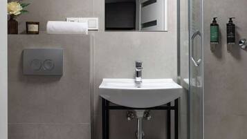 Shower, hair dryer, shampoo