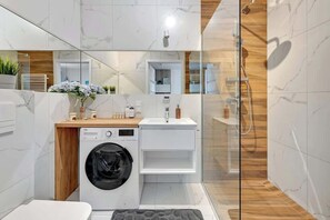 Shower, hair dryer, shampoo