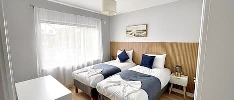 1 bedroom, desk, iron/ironing board, travel cot