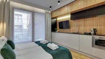 Iron/ironing board, travel crib, WiFi, bed sheets