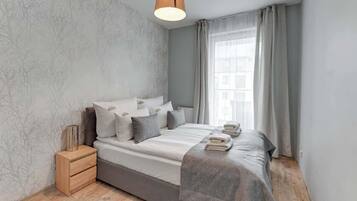 Iron/ironing board, travel crib, WiFi, bed sheets