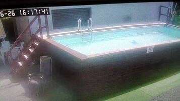 Seasonal outdoor pool, open 9:00 AM to 8:00 PM, pool loungers
