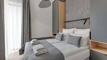2 habitaciones, tabla de planchar con plancha, wifi y ropa de cama